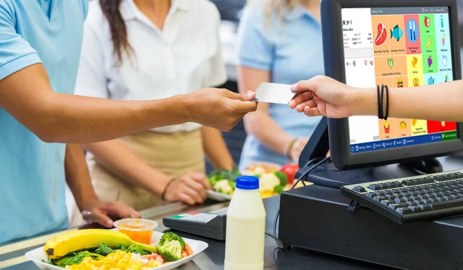 Student buying lunch with a cashless card