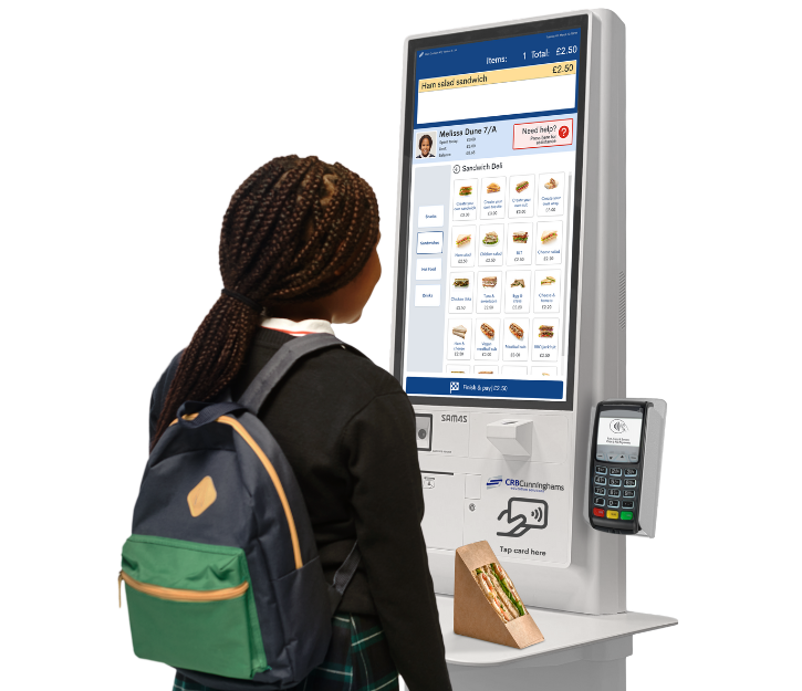 Pupil paying for their school meal using a Self-Serve Kiosk