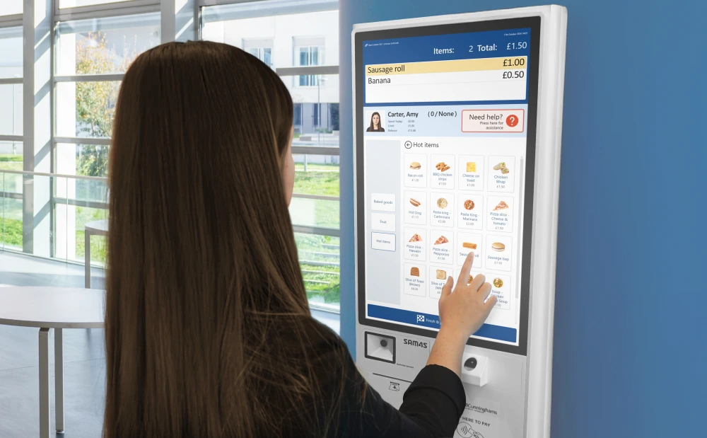 Student using a Self-Serve Kiosk to order a school meal