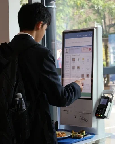 Tiffin School student buys lunch with a Self-Serve Kiosk