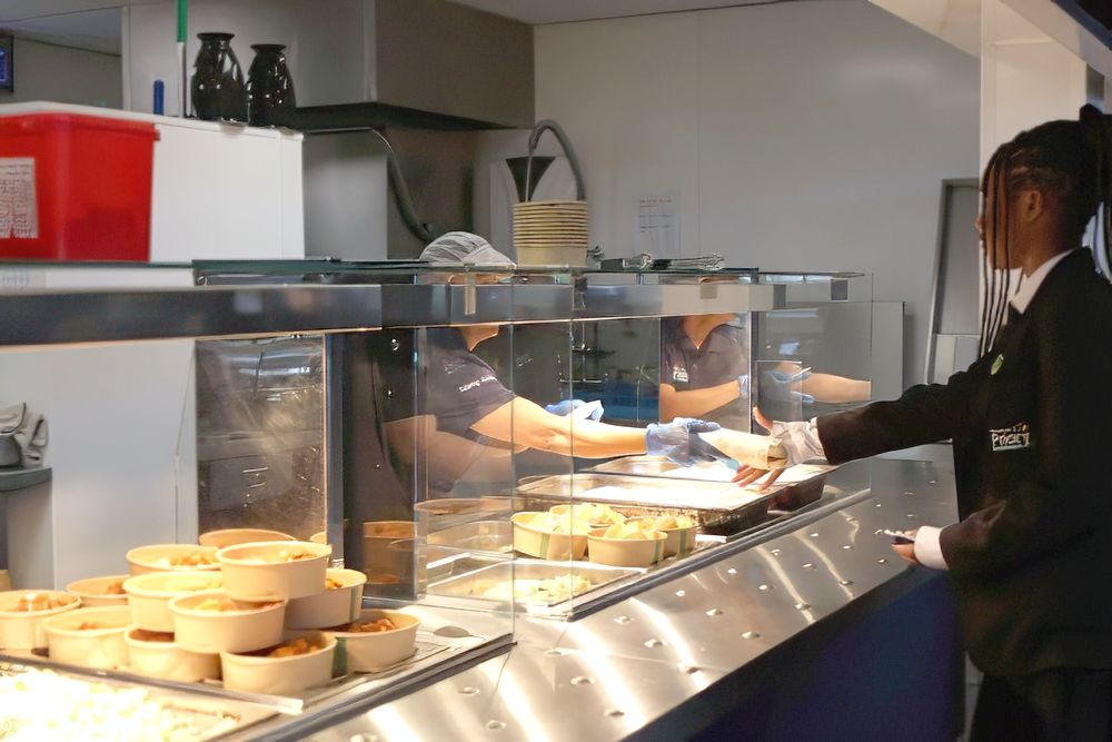 Student collecting a school meal