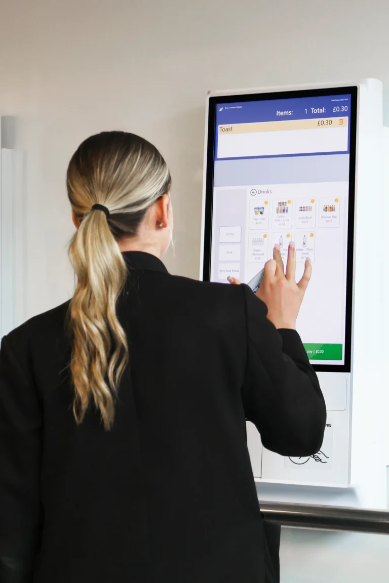 Student orders lunch at a Self-Serve Kiosk