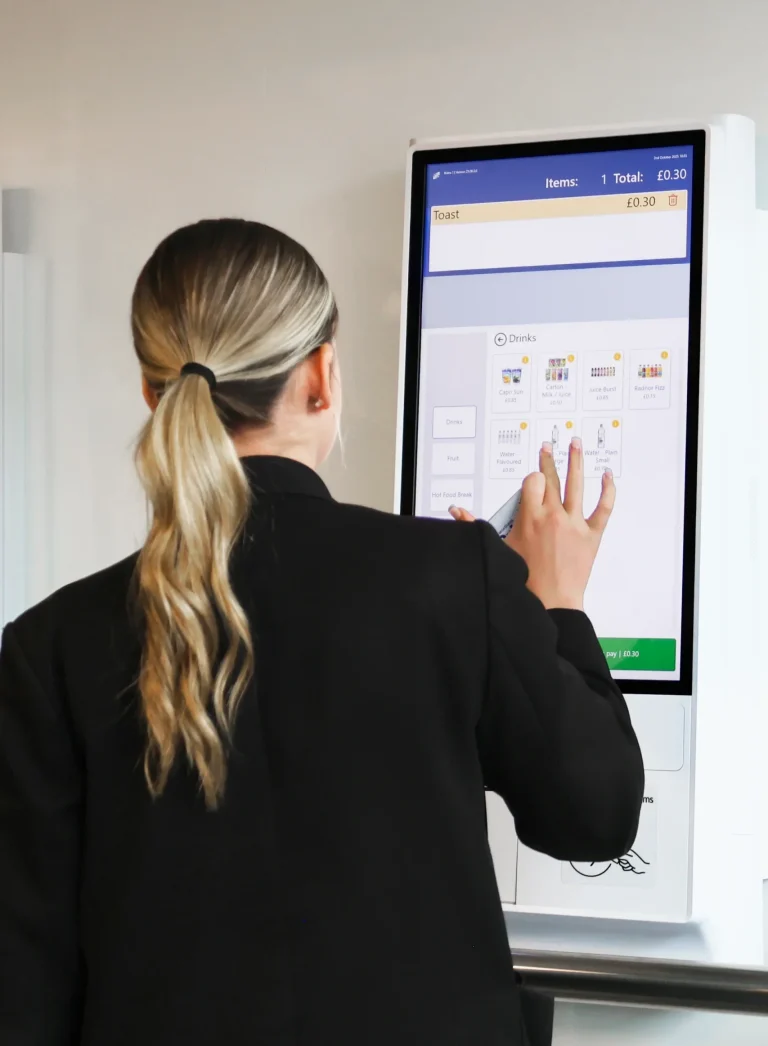 Student orders lunch at a Self-Serve Kiosk