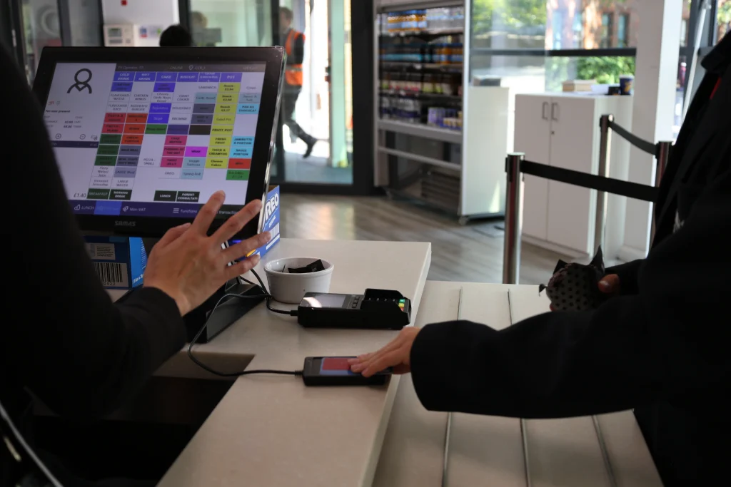 Pupil using Fusion cashless catering till to pay for school meal